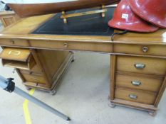 Twin pedestal leather topped light wood partners style desk. Tambour rollers one side and drawers