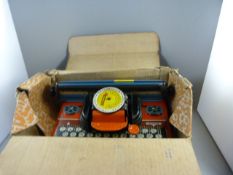 A Mettoy Mettype portable childrens typewriter
