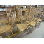 A Set of eight stick back chairs to include two carvers