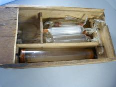 A Pine wooden case containing Chemistry equipment
