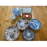 An oriental blue and white teapot and other dishes etc