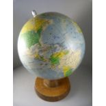 A Vintage globe on wooden base