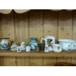 A quantity of crested ware, Torquay ware and Portmeirion etc