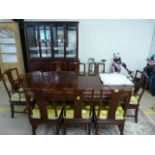 A Darkwood chinese dining room suite - consisting of dresser, nest of tables round dining room table