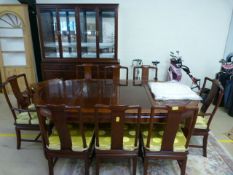 A Darkwood chinese dining room suite - consisting of dresser, nest of tables round dining room table