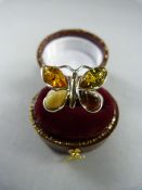 A Silver ring with Amber stones - Butterfly design - Size UK L USA 5.5