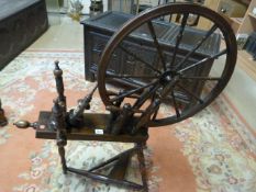 A Mahogany spinning wheel Marked E P - Condition good