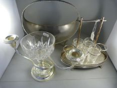 A large silverplated one handled bowl, candleabra with sweet bread bowl and a shot glass carrier