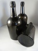 Three vintage black glass bottles W.G.B & co Deptford