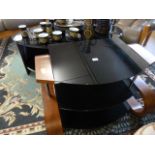 Three Modern pieces of furniture with glass tops to include - TV stand, coffee table and a similar