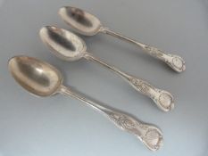 Three Silver coloured metal serving spoons