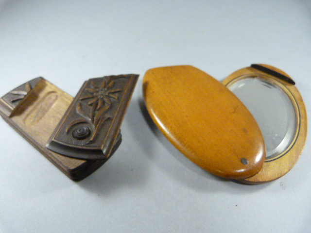An oak match striker with hidden compartment and a Treen pocket mirror in oval form