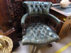 Green leather captains swivel chair