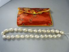 A Large Baroque pearl necklace