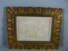 A Framed Alabaster wall plaque