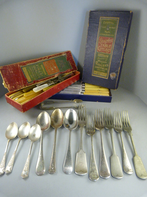 A small quantity of silverplated cutlery along with two boxed sets of knives