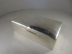 A Hallmarked Sheffield Silver cigarette box made by Walker & Hall 1926 - Inscription to front - N.