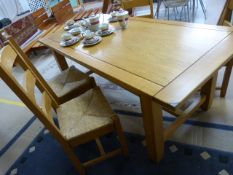 A Solidwood oak table and 4 matching chairs