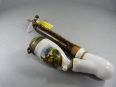 A Continental tobacco pipe with china well depicting deer in a woodland