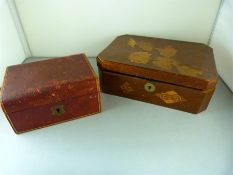 An oak box with inlaid flowers and a leather bound jewellery box