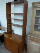 A G-Plan Cupboard with bookcase over