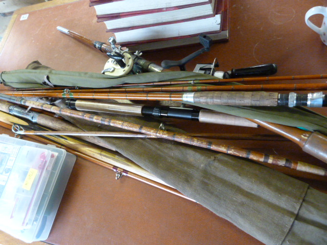 Large quantity of various fishing rods, vintage along with reels and flys - Image 2 of 4