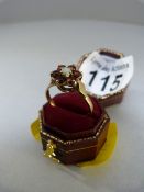 9ct Gold ring set with opals and garnets
