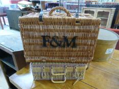 A Fortnum and Mason picnic hamper and one other