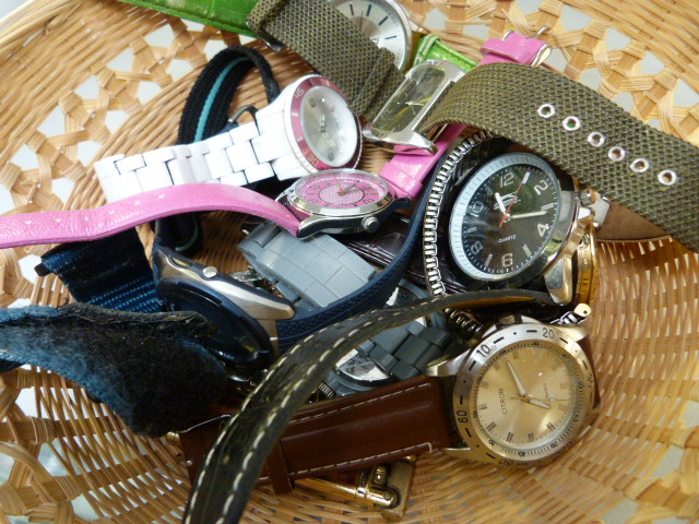 Basket containing various watches