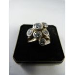 Silver contemporary ring set with six CZ stones. Size K UK, 5 1/8 USA