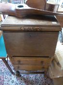 An oak bureau with two drawers in the Art Nouveau style - key in office