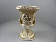 A Capodimonte urn (no lid) moulded in relief and glazed with a gold finish - stamped to base