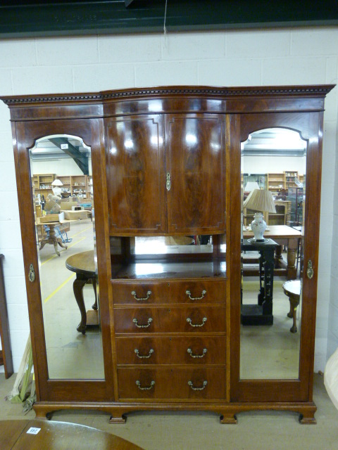 A Mahogany Triple wardrobe with four drawers - (Keys in office)