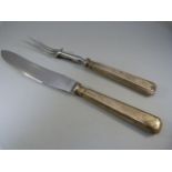 John Biggin (subsequently John Biggin Ltd) 1941 meat carver Knife and fork. Silver handles,