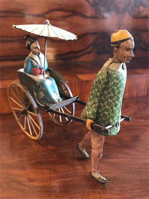 Lehmann clockwork painted tinplate Masuyama rickshaw (773). Length approx. 18cm, height approx.