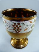 An Antique Copper lustre style goblet - with handpainted decoration around the bowl. early 20th