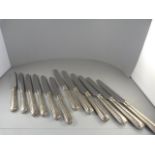 A Set of 12 silver handled knives - assay sheffield 1970