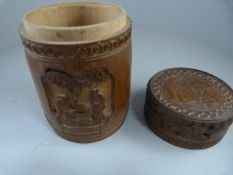 A Chinese carved bamboo brush pot with markings inside and to base - Clear cracks to sides,