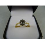 An 18ct Yellow Gold Diamond 'Daisy' Cluster Ring - small swiss cut centre stone with 6 diamond chips