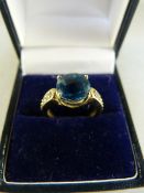 9ct Gold ring with blue Topaz stone