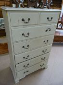 Green painted tall boy of seven drawers