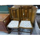 A pair of inlaid hall chairs
