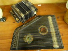 A Mandolin Harp made in Saxony and a Campbell and Co Accordion