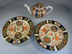 Pair of Royal Crown Derby cabinet plates decorated in the Imari style and a Meissen teapot and cover