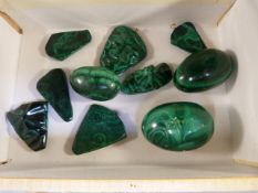 Quantity of Malachite stones - seven carved into Tribal masks and Three into eggs - some A/F