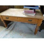 An oak coffee table with single drawer