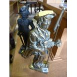 Cast iron doorstop of a soldier and one other