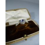 9ct ring set with pale lavender heart shaped stone (possibly Topaz) surrounded by diamonds in a heat