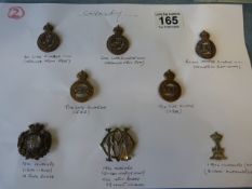 Eight cap badges from various Cavalry Regiments