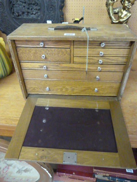 Oak specimen chest with various drawers - (key attached)